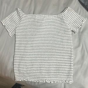 It’s a art class off the shoulder shirt, white white black lines, large (10/12)